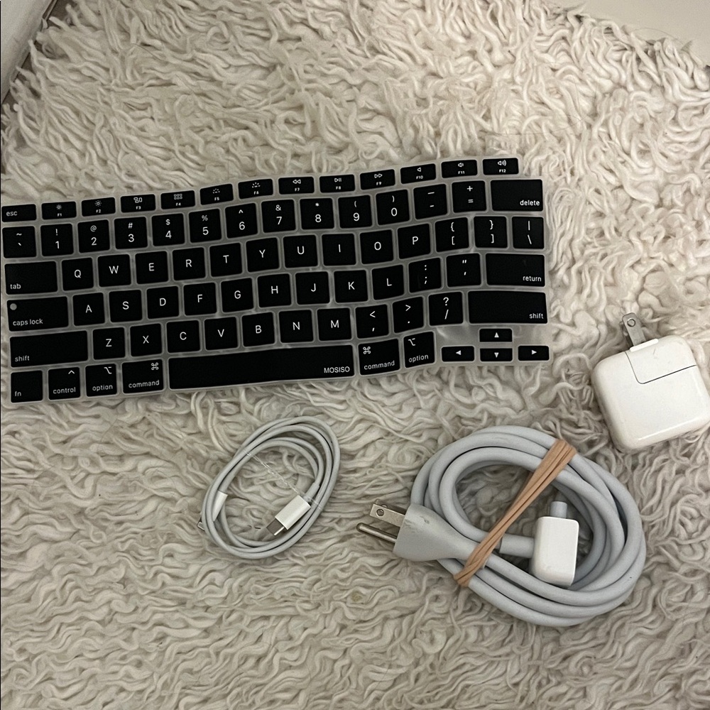 Black Silicone Keyboard Cover with White Charging Cables
